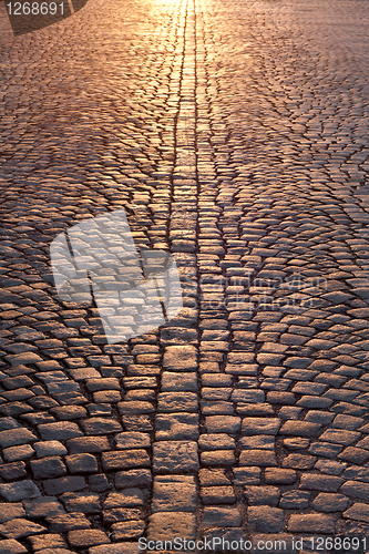 Image of stone pavement in evening sunlight