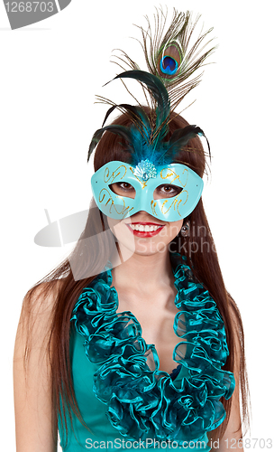 Image of brunette girl in a blue dress and mask