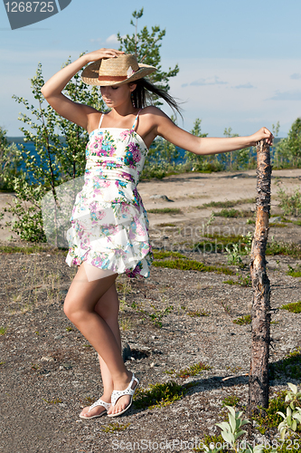 Image of girl in a straw hat