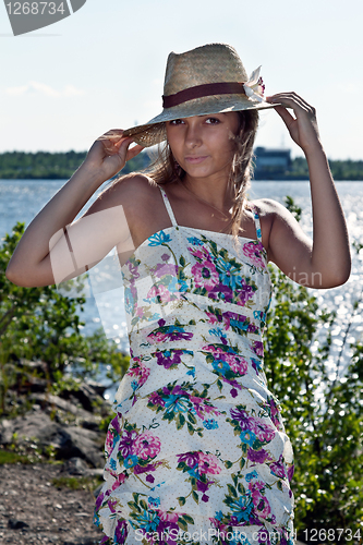 Image of girl in a straw hat