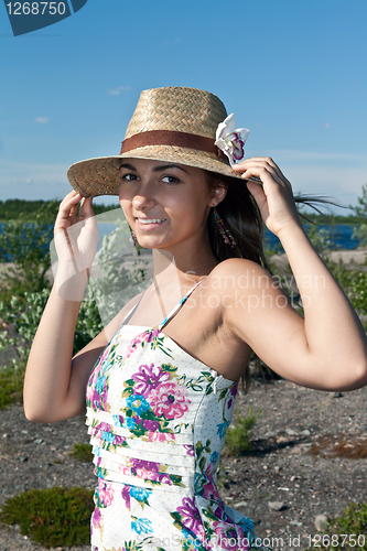 Image of girl in a straw hat