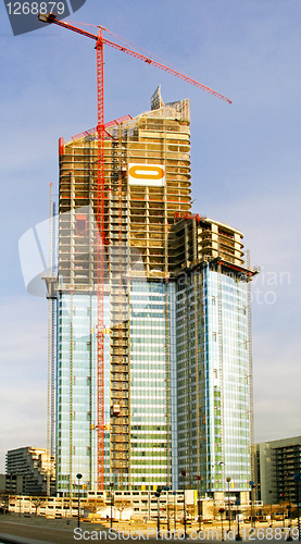 Image of Sunny skyscraper construction