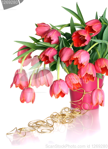 Image of Bouquet of pink tulips on a white background.