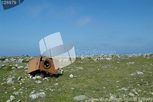 Image of Rusty junk on grass