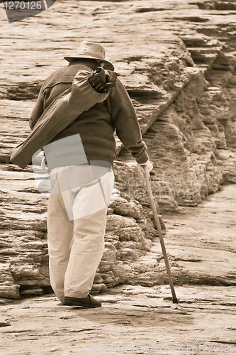 Image of Old man walking