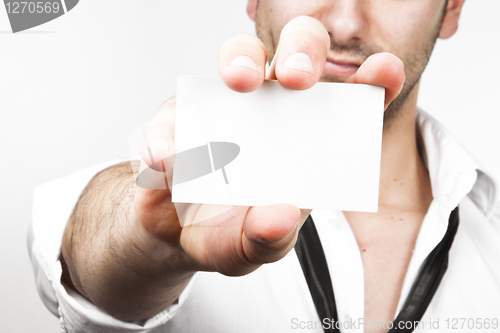 Image of Sexy businessman showing his businesscard