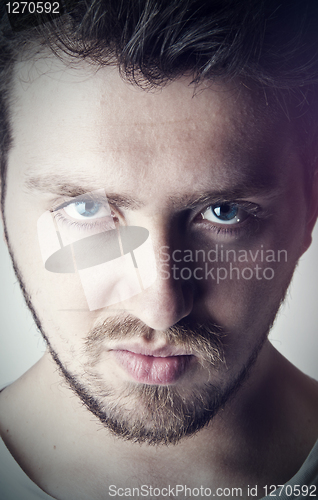 Image of Young handsome man with blue eyes