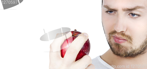 Image of Man staring at an apple