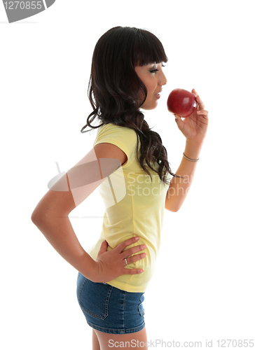 Image of Healthy girl eating fruit