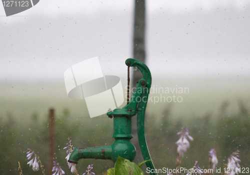 Image of Waterpump in rain