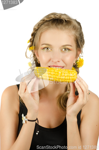 Image of woman eating corn-cob