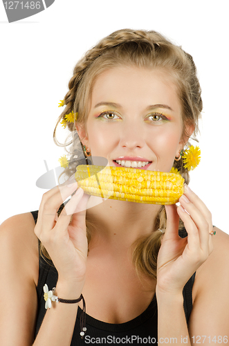 Image of woman eating corn-cob