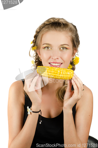 Image of woman eating corn-cob