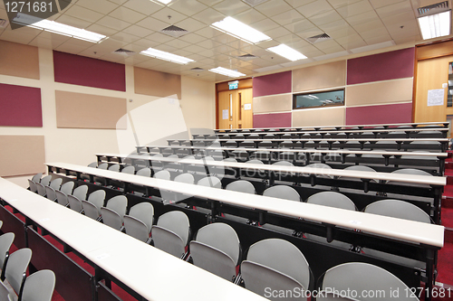 Image of Empty hall for presentation with grey armchairs 