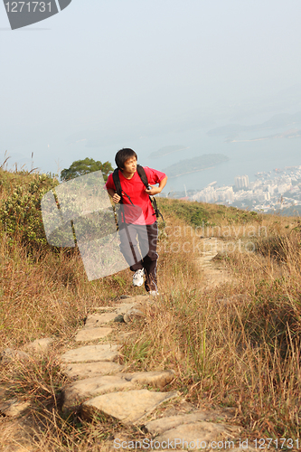 Image of Sport hiking in mountains, walking and backpacking 