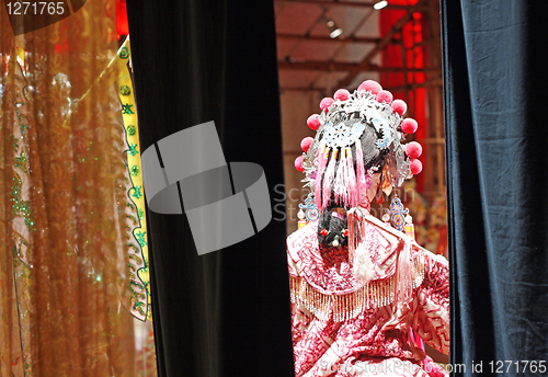 Image of chinese dummy opera, looking after the stage