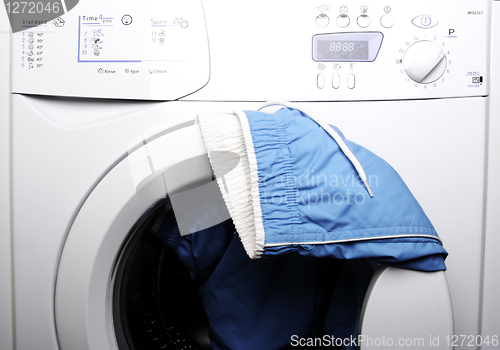 Image of Trousers and laundry.