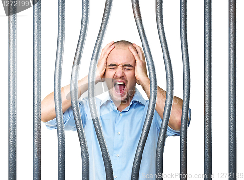 Image of stressed prisoner and bended metal bar
