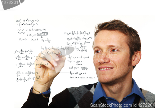Image of man write maths formula