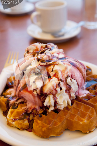 Image of Waffles with ice cream and whipped cream