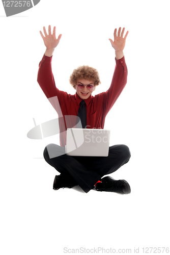 Image of Businessman sitting with Laptop
