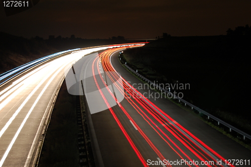 Image of highway at night with traffic