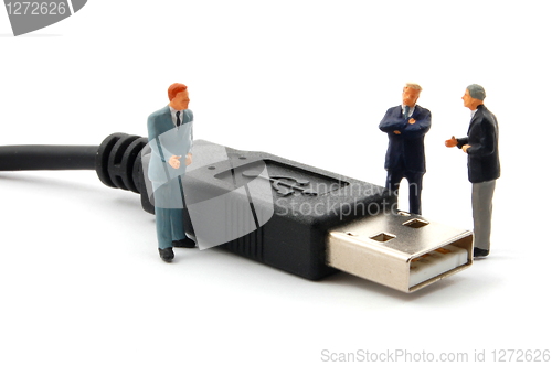 Image of business man and usb connector