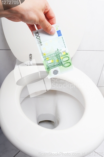 Image of money and toilet