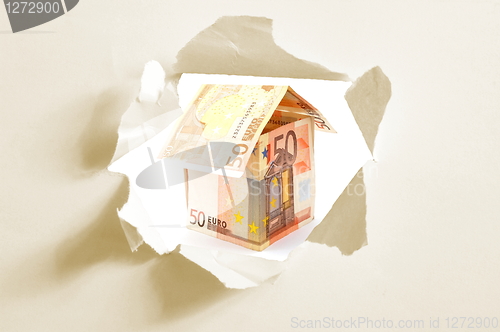 Image of euro money house and paper hole