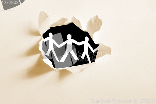 Image of paper man in a hole