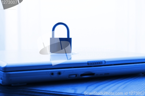 Image of notebook and padlock