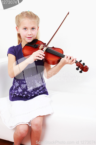 Image of Little girl playing violin