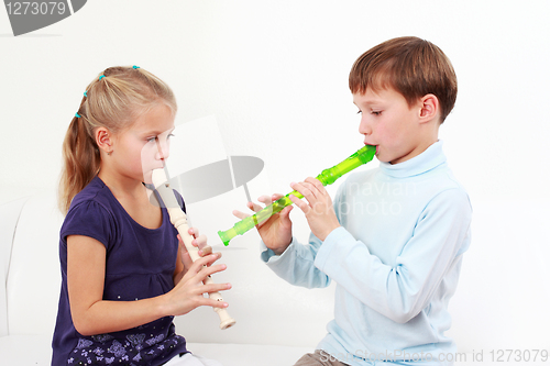 Image of Kids playing flute