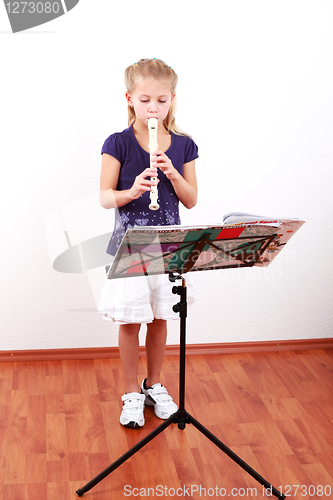 Image of Girl playing flute