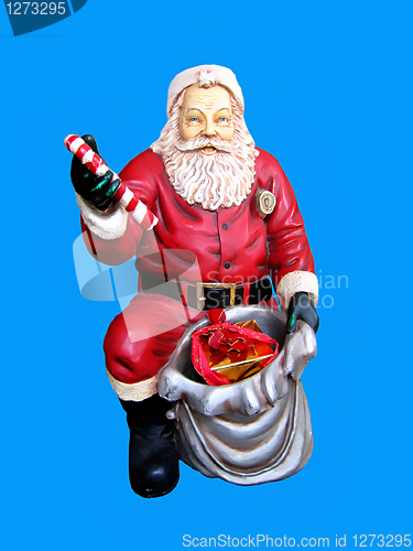 Image of figure of santa claus isolated on blue