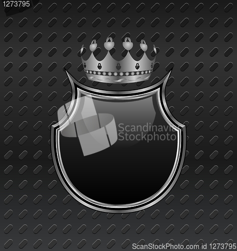 Image of heraldic shield and crown on metallic background