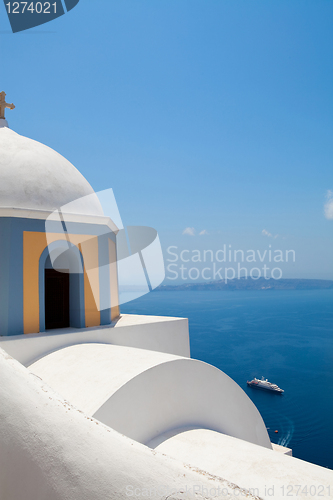 Image of Old church dome and view of mediterranean sea in Santorini