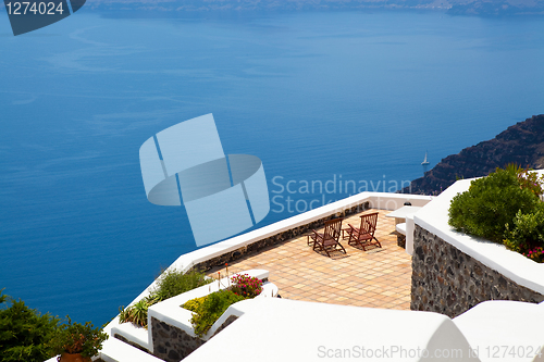 Image of Deck chairs in Thira, Santorini, Greece