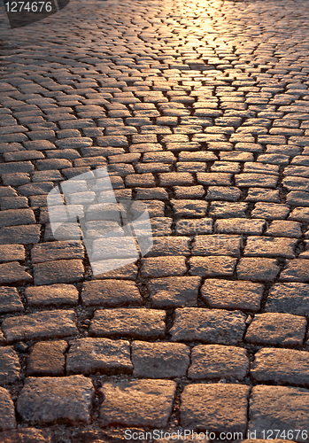 Image of stone pavement in evening sunlight