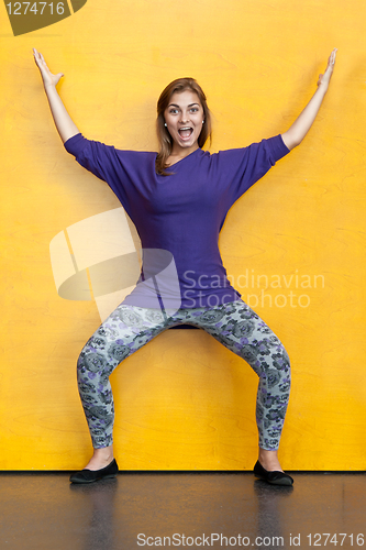 Image of Beautiful girl in purple sweater