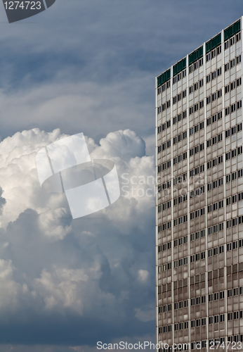 Image of High building and bulk cumulus