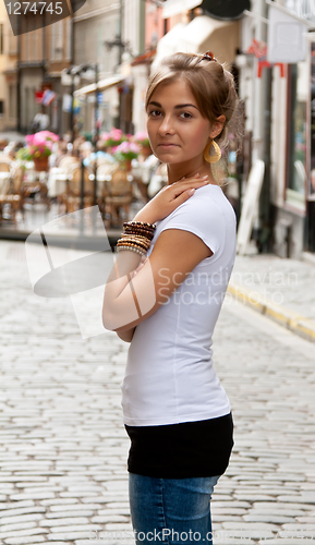 Image of Beautiful girl in the old streets