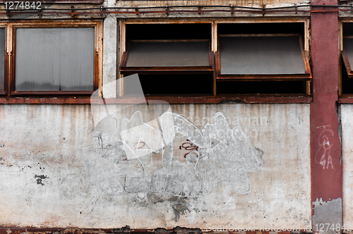 Image of Old abandoned industrial building with windows