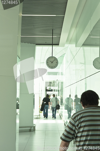 Image of Passengers with luggage in the airport