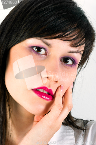Image of Beautiful young woman with attractive makeup