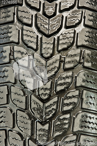 Image of Close up shot of a wet car tire
