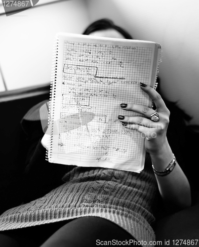 Image of woman studying indoor