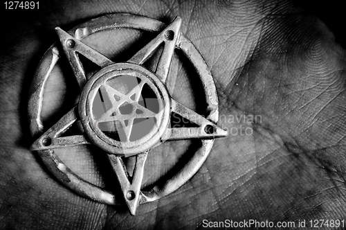 Image of Pentagram in hand macro shot 