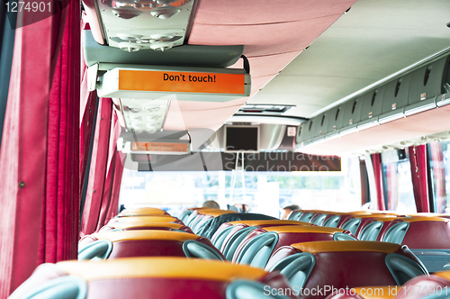 Image of Interior of big coach bus with leather seats