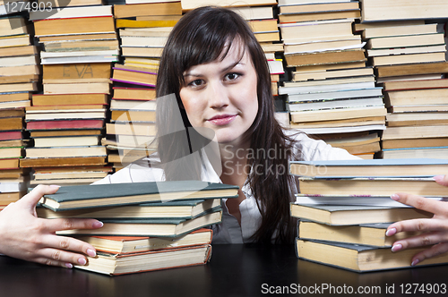 Image of Young college student with her books